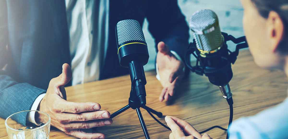 Podcast speaking by using microphones Podcast speaking by using microphones